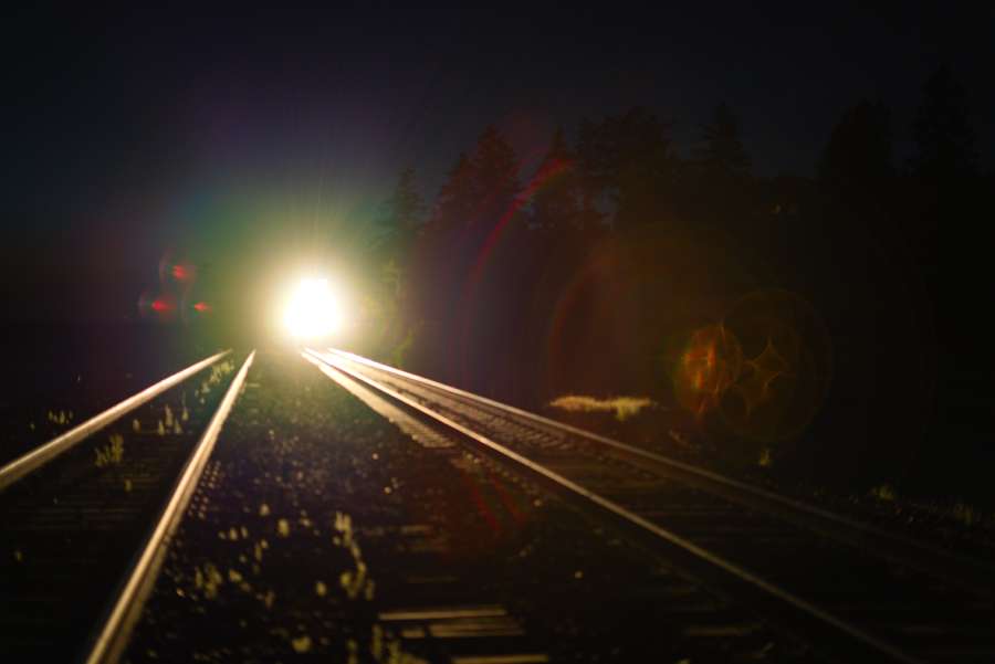 train approaching anf headlight causing huge lens flare.