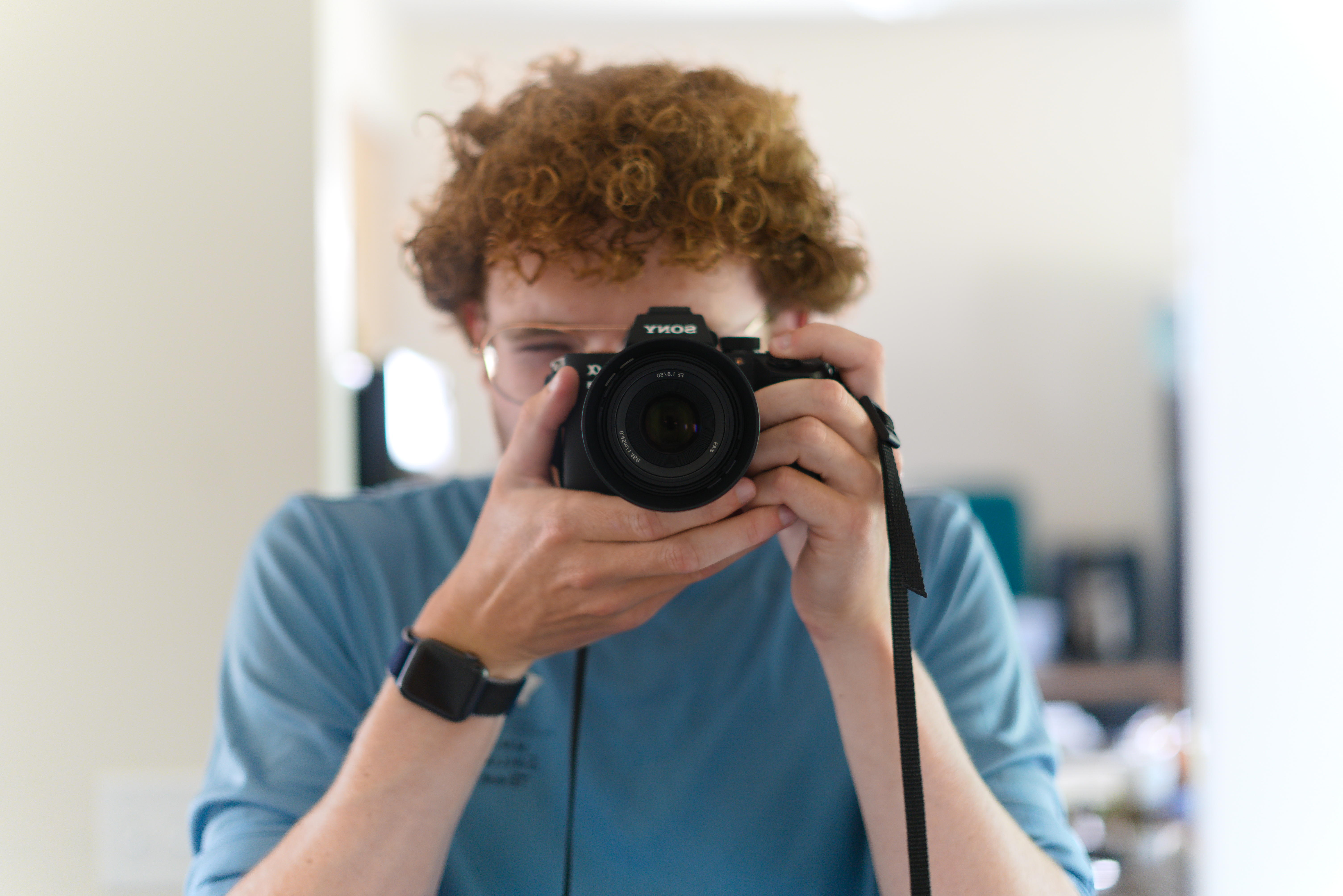 self portrait of me holding camera